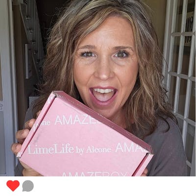 A woman with LimeLife's AMAZEBOX