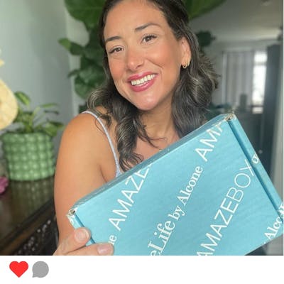 A woman with LimeLife's AMAZEBOX