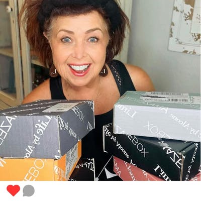 A woman with LimeLife's AMAZEBOX